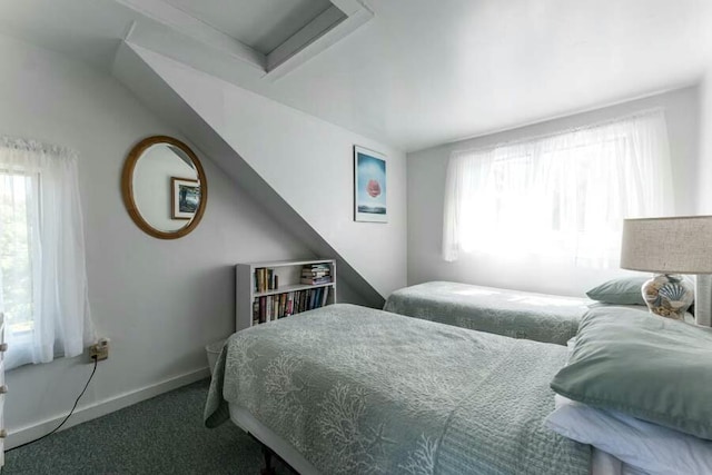 232 Robbins Hill Rd, Brewster, MA 02631 - carpeted bedroom featuring baseboards, vaulted ceiling, multiple windows, and attic access
