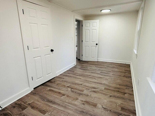 379 Main St, Mashpee, MA 02649 - empty room featuring wood finished floors and baseboards