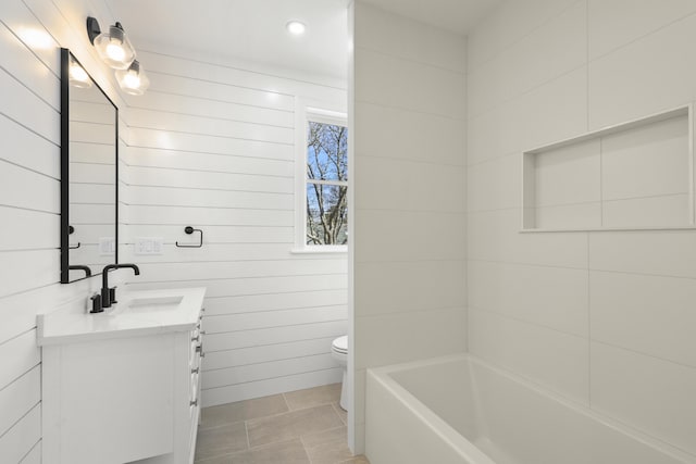 63 Ovington Dr, East Falmouth, MA 02536 - full bath with toilet, tile patterned flooring, a bathtub, and vanity