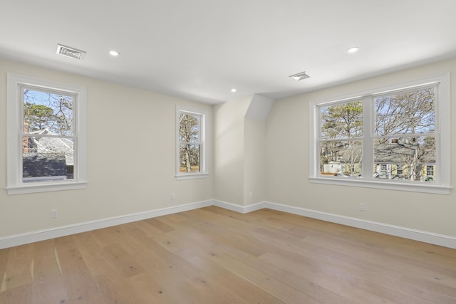 63 Ovington Dr, East Falmouth, MA 02536 - unfurnished room with baseboards, visible vents, and light wood finished floors