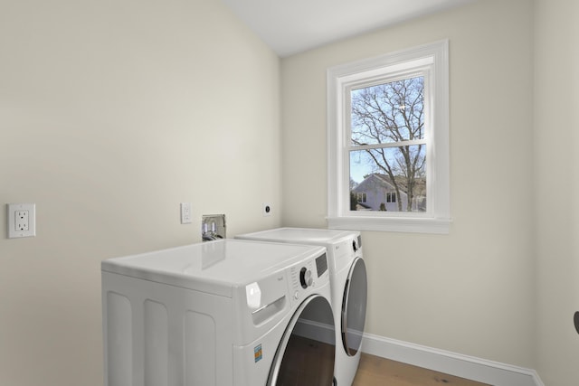 63 Ovington Dr, East Falmouth, MA 02536 - laundry room with baseboards, laundry area, separate washer and dryer, and light wood-type flooring
