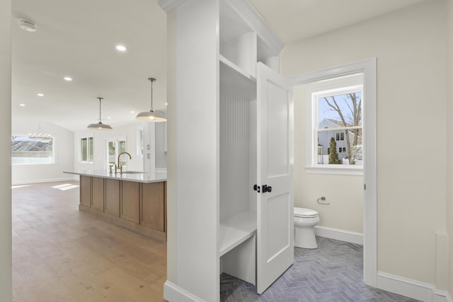 63 Ovington Dr, East Falmouth, MA 02536 - bathroom with vanity, recessed lighting, toilet, baseboards, and wood finished floors
