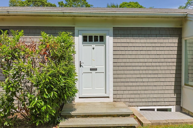 26 Hinckley Cir, Osterville, MA 02655 - entrance to property with a shingled roof