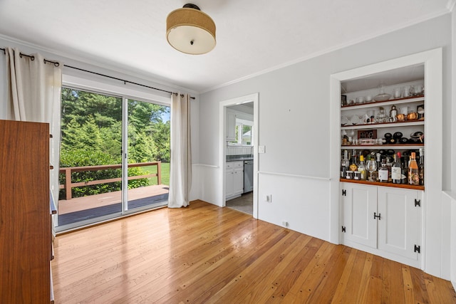 26 Hinckley Cir, Osterville, MA 02655 - unfurnished dining area featuring light wood finished floors and crown molding