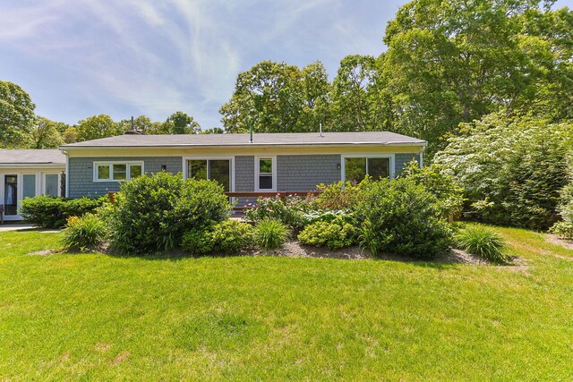 26 Hinckley Cir, Osterville, MA 02655 - view of front of house featuring a front lawn
