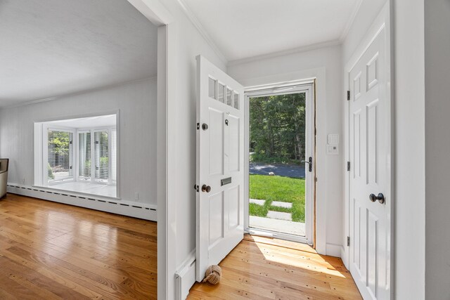 26 Hinckley Cir, Osterville, MA 02655 - entryway with a baseboard heating unit, ornamental molding, healthy amount of natural light, and hardwood / wood-style floors