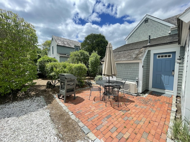 17 Hydrangea Ln, Mashpee, MA 02649 - view of patio featuring outdoor dining area and ac unit