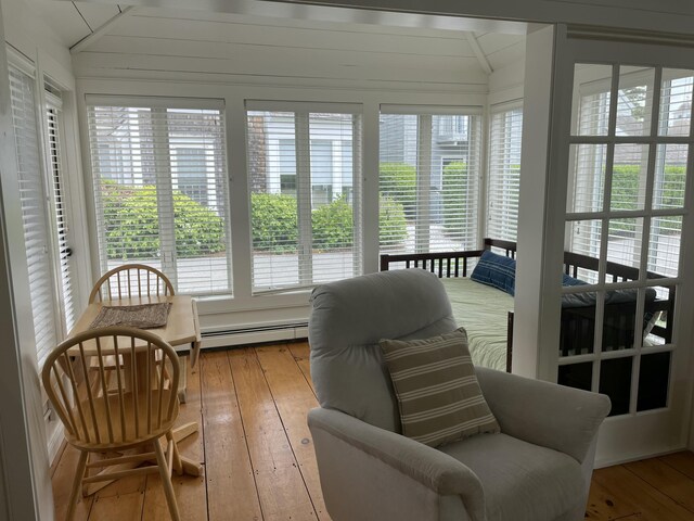 17 Hydrangea Ln, Mashpee, MA 02649 - sunroom with a baseboard radiator, hardwood / wood-style flooring, and lofted ceiling