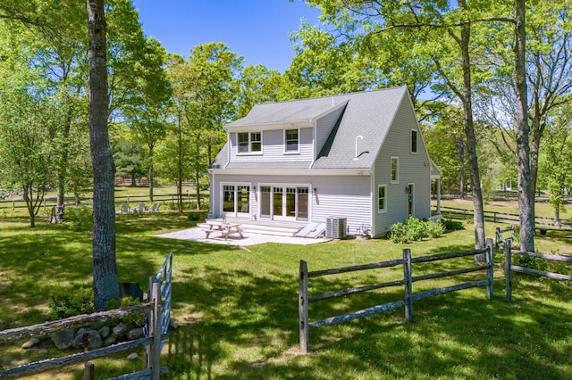 21 Cloverfield Way, Hatchville, MA 02536 - rear view of property featuring central AC unit, a patio area, and view of scattered trees