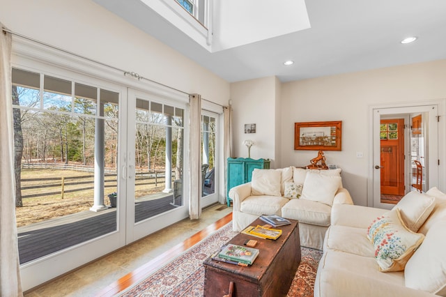 21 Cloverfield Way, Hatchville, MA 02536 - living area with plenty of natural light, french doors, light wood-type flooring, recessed lighting, and a skylight