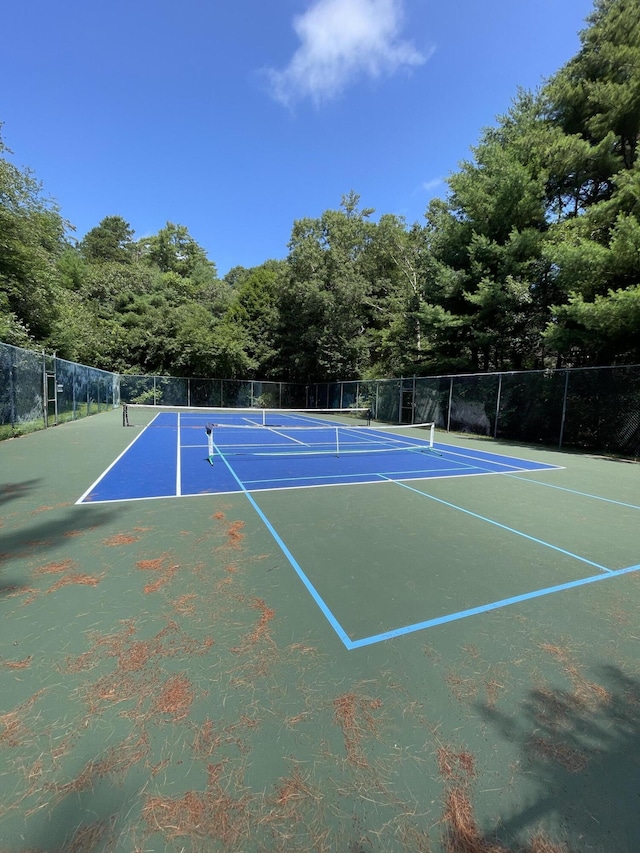 view of sport court with community basketball court and fence