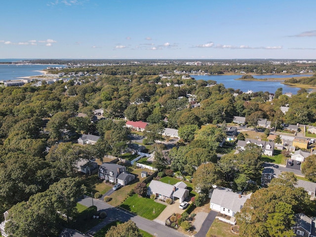 birds eye view of property featuring a water view and a residential view