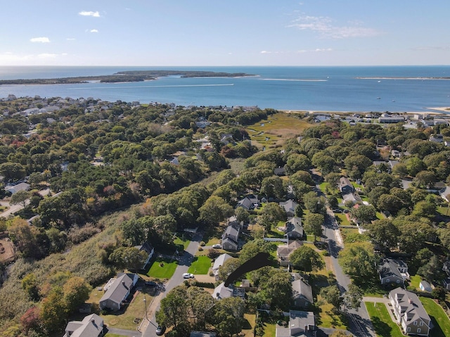 birds eye view of property featuring a water view and a residential view