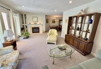92 Cliffside Dr Unit 92, Cedarville, MA 02360 - carpeted living area with recessed lighting, a fireplace, and healthy amount of natural light