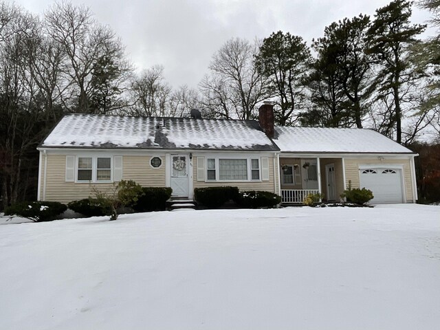 95 Anchor Ln, Cotuit, MA 02635 - kitchen with freestanding refrigerator, stainless steel range with gas stovetop, paneled dishwasher, black microwave, and a sink