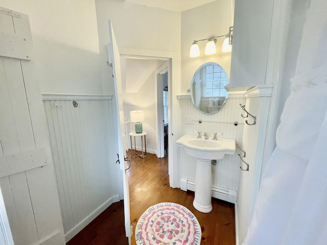 25 Milestone Way, Mashpee, MA 02649 - bathroom featuring wood finished floors, wainscoting, and a sink