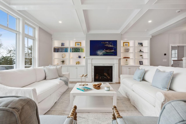 44 Tonset Rd, Orleans, MA 02653 - living room with coffered ceiling, crown molding, beam ceiling, and a premium fireplace