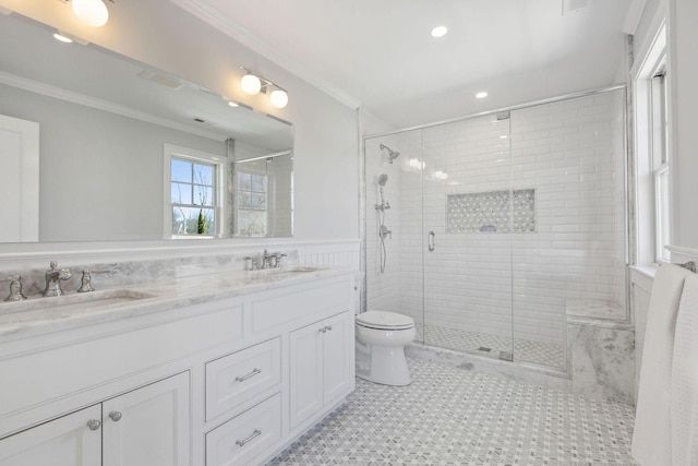 44 Tonset Rd, Orleans, MA 02653 - bathroom featuring double vanity, wainscoting, a sink, and crown molding