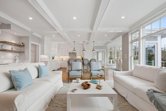 44 Tonset Rd, Orleans, MA 02653 - living area featuring recessed lighting, light wood-style flooring, beamed ceiling, and crown molding