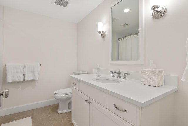 full bath featuring tile patterned flooring, visible vents, toilet, and baseboards