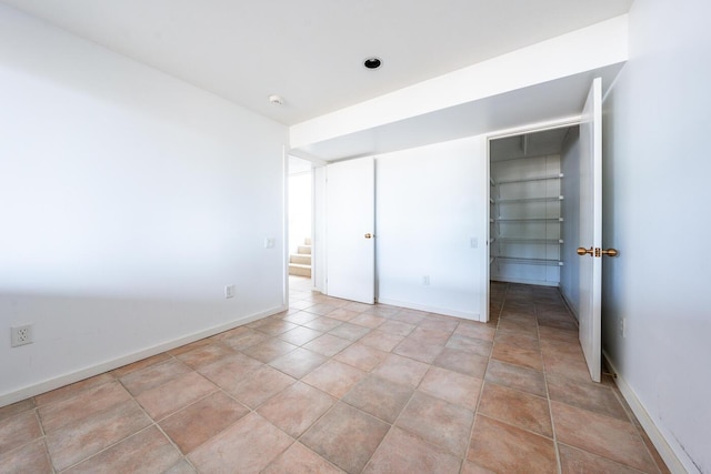 unfurnished bedroom featuring a closet