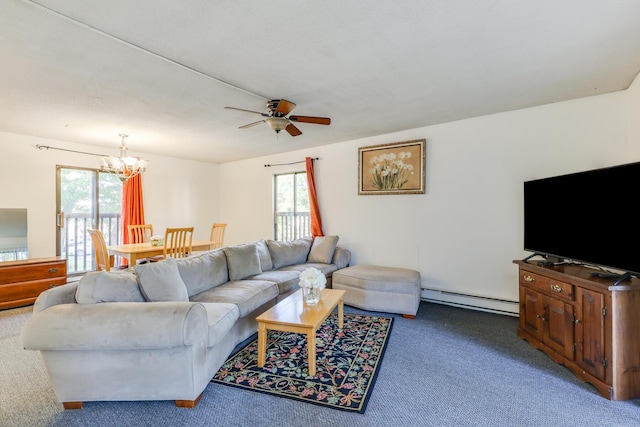 carpeted living room with ceiling fan with notable chandelier and a baseboard radiator