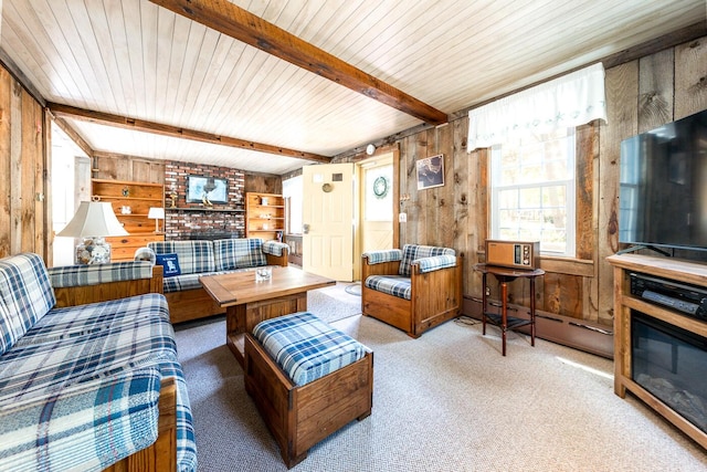 40 Georges Way, Wellfleet, MA 02667 - living room with wood walls, wood ceiling with exposed beams, and carpet