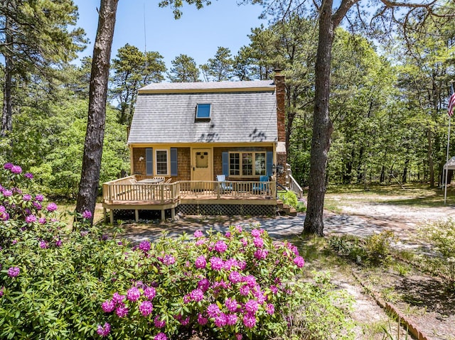 40 Georges Way, Wellfleet, MA 02667 - rear view of property featuring a wooden deck, a chimney, and a gambrel roof