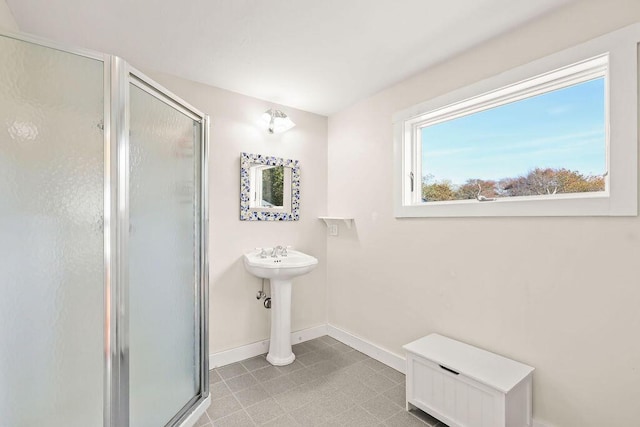 bathroom featuring an enclosed shower