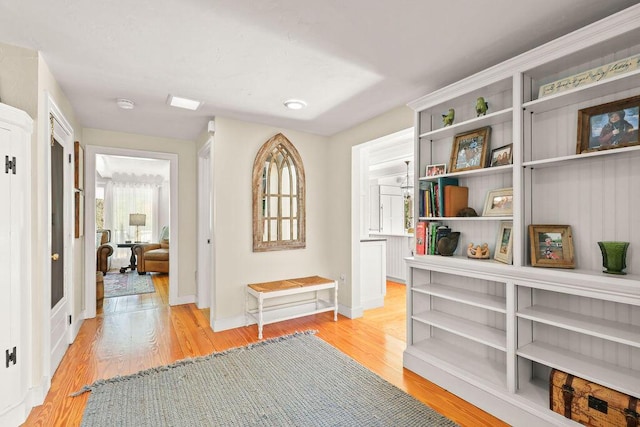 corridor featuring light hardwood / wood-style flooring