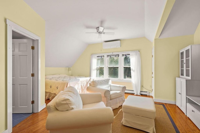 bedroom featuring lofted ceiling, hardwood / wood-style flooring, ceiling fan, a baseboard heating unit, and an AC wall unit