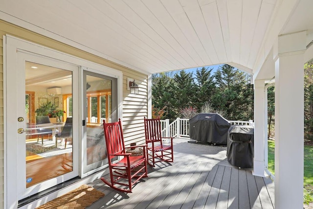 deck featuring area for grilling and a porch