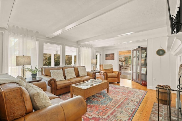 sunroom with beam ceiling