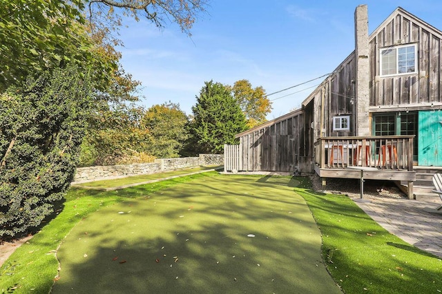 view of yard featuring a deck