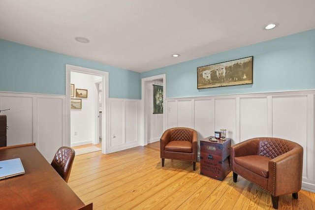 sitting room with light hardwood / wood-style floors