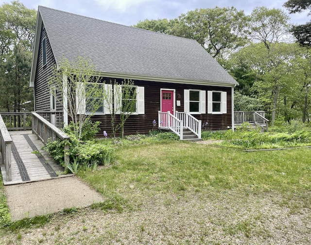 12 Park Ave, Vineyard Haven, MA 02568 - view of front of home with roof with shingles and a wooden deck