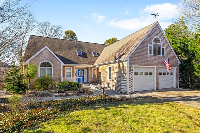 rear view of house with a deck and a lawn