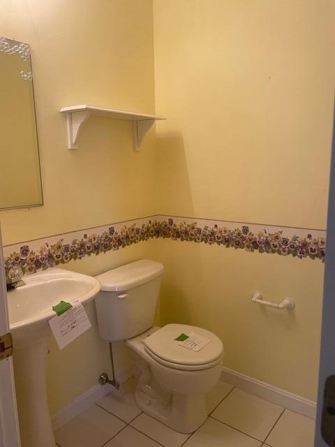 12 Red Cedar Rd, Mashpee, MA 02649 - half bathroom with tile patterned floors and toilet