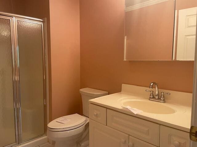 12 Red Cedar Rd, Mashpee, MA 02649 - full bath featuring vanity, a shower stall, toilet, and ornamental molding