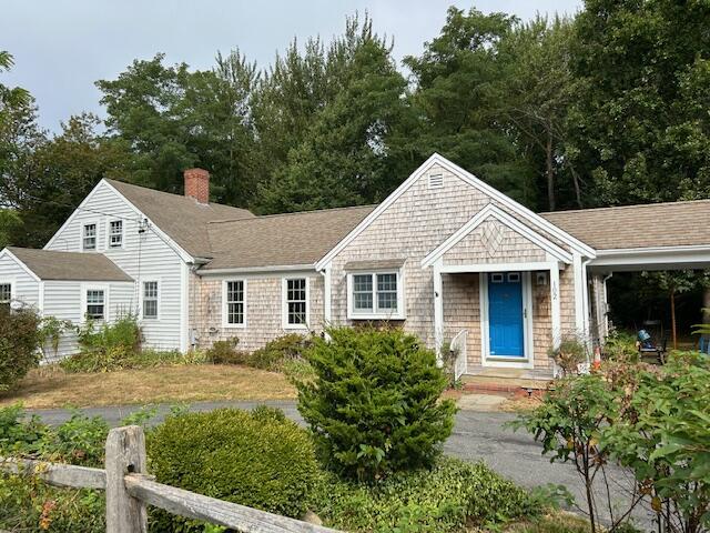 102 Portanimicut Rd, Orleans, MA 02653 - view of front of home with a chimney and a shingled roof