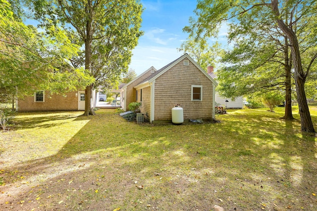 view of home's exterior featuring a lawn