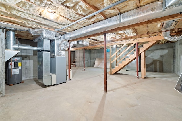 basement with heating unit and electric water heater