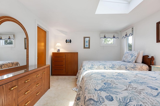 24 Sparrowhawk Rd, Orleans, MA 02653 - bedroom featuring light colored carpet and a skylight
