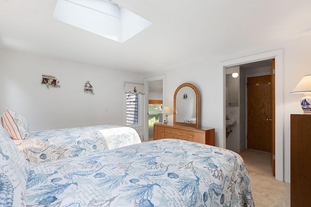 24 Sparrowhawk Rd, Orleans, MA 02653 - bedroom with light carpet, a skylight, and ensuite bath