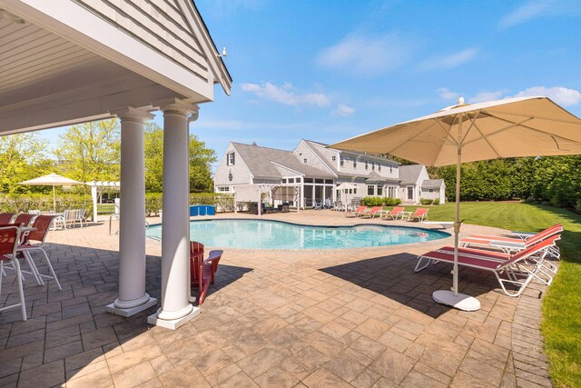 10 Shiverick Rd, East Dennis, MA 02641 - outdoor pool featuring a patio and a lawn