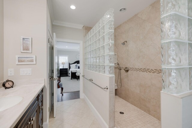10 Shiverick Rd, East Dennis, MA 02641 - ensuite bathroom with crown molding, walk in shower, vanity, recessed lighting, and tile patterned floors