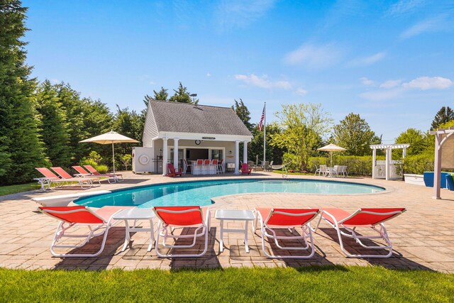 10 Shiverick Rd, East Dennis, MA 02641 - community pool with a patio area, an outdoor structure, an exterior structure, and a pergola