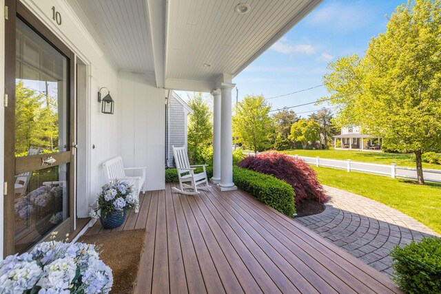 10 Shiverick Rd, East Dennis, MA 02641 - wooden porch with a yard
