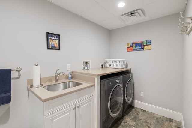 10 Shiverick Rd, East Dennis, MA 02641 - washroom with separate washer and dryer and dark stone finish flooring
