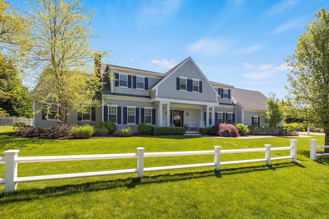 10 Shiverick Rd, East Dennis, MA 02641 - shingle-style home with a fenced front yard